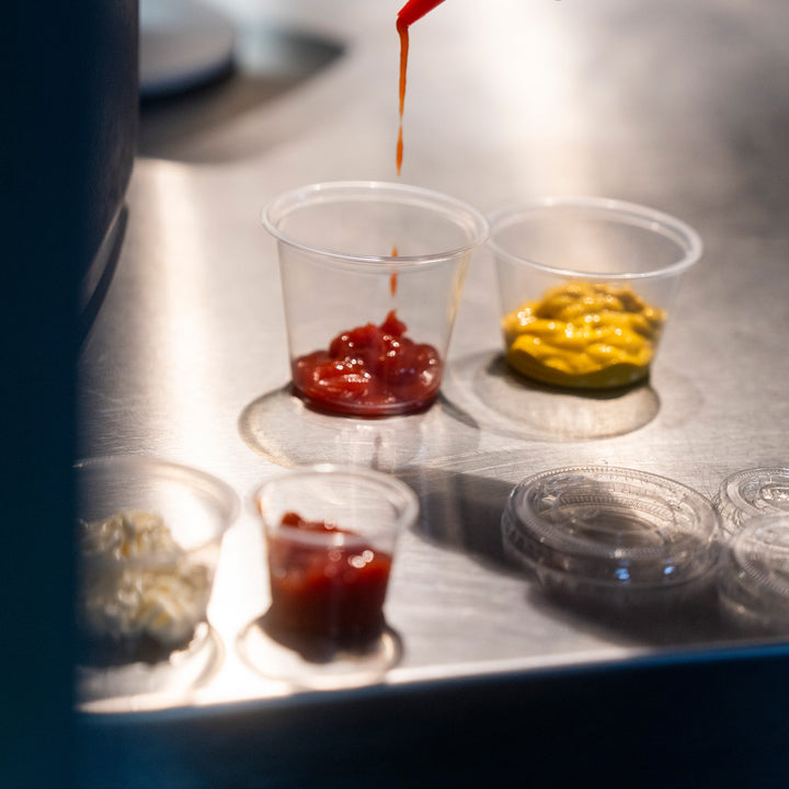 Packaging Wise 3oz clear PET condiment cup — ideal for ketchup, mayo & mustard servings.