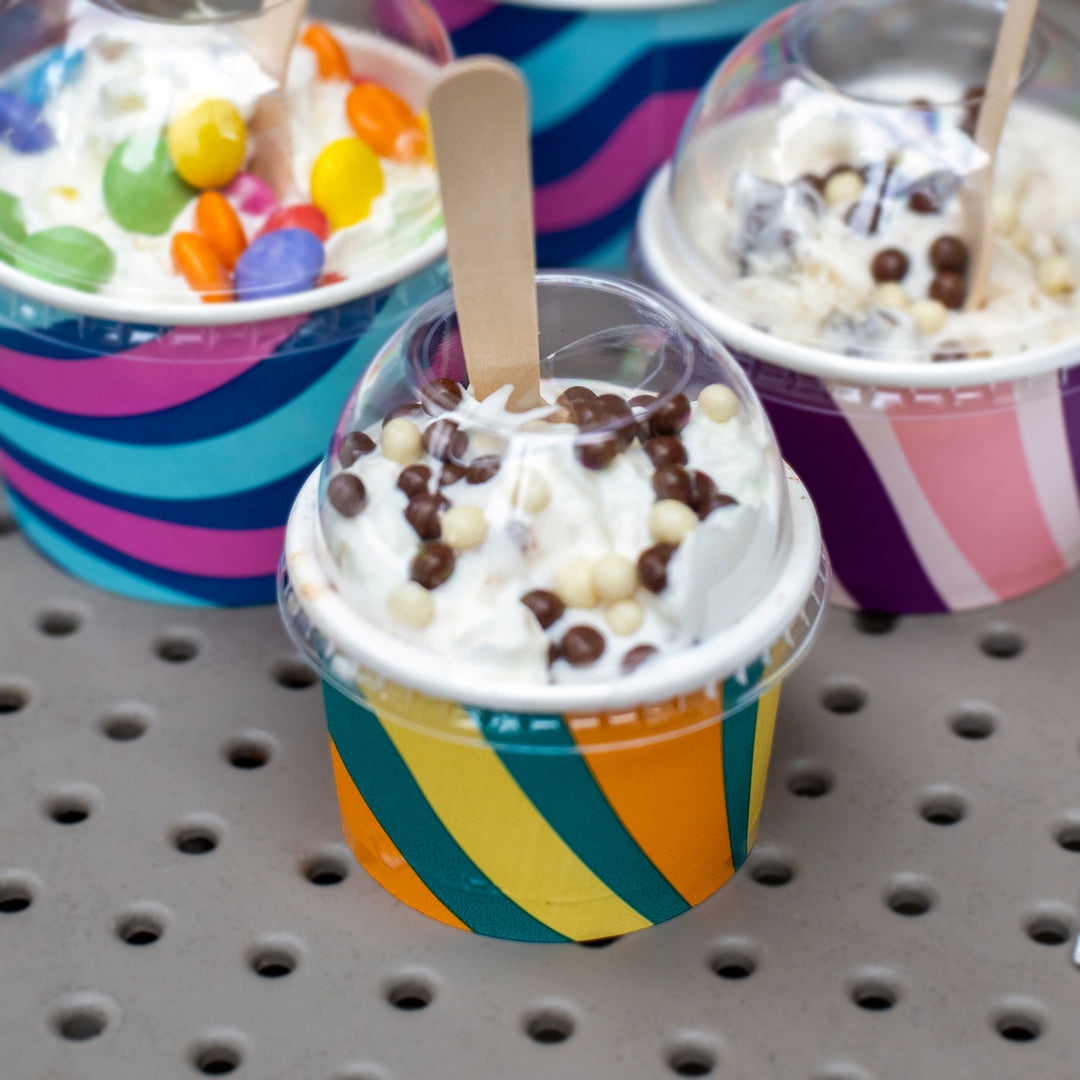 Packaging Wise 4oz clear RPET dome lid — crystal-clear recyclable lid that enhances dessert presentation, perfect for cafés and frozen treat counters to boost visual appeal.