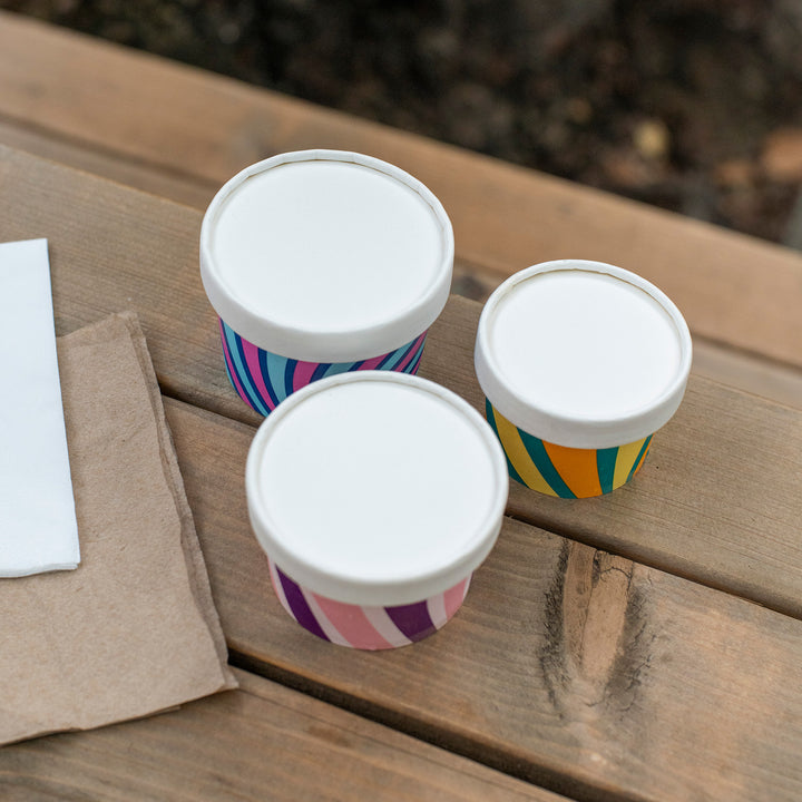 Packaging Wise 4oz white paper lid — clean, minimal finish for professional takeaway packaging, perfect for safe transport of desserts and sauces.